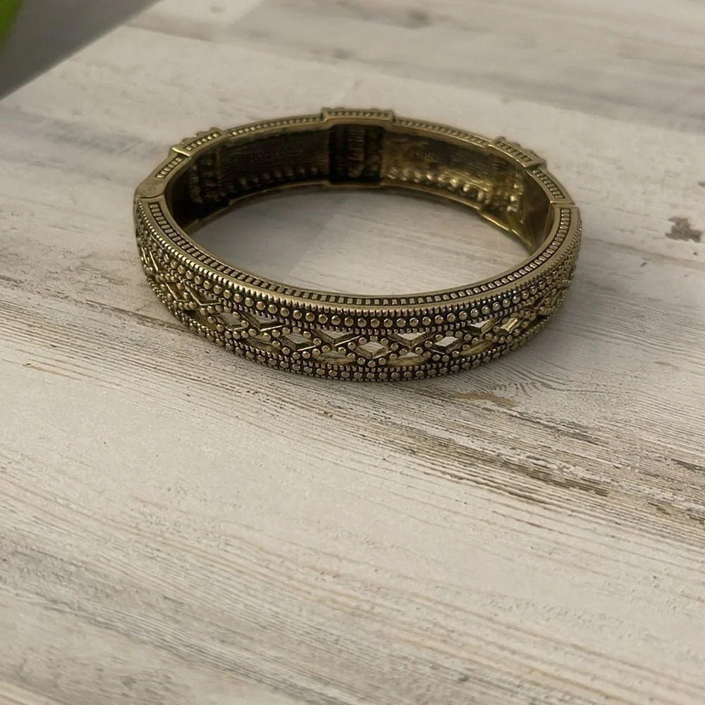 Heidi Daus Crystal Hinged Bangle Bracelet Topaz Champagne Tone